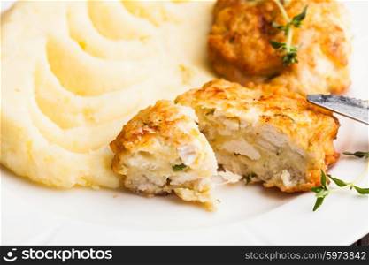 Chicken cutlets and potato puree in a plate close up. Cutlets with potato