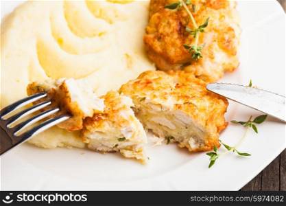 Chicken cutlets and potato puree in a plate close up. Cutlets with potato