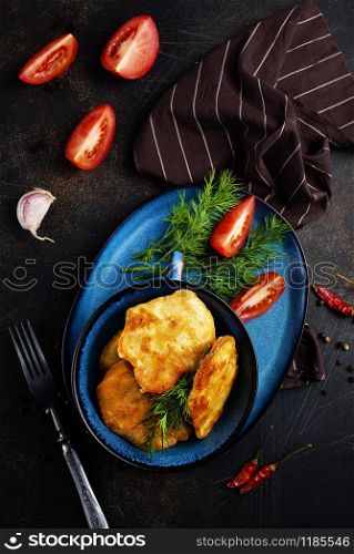chicken cutlets in bowl on a table