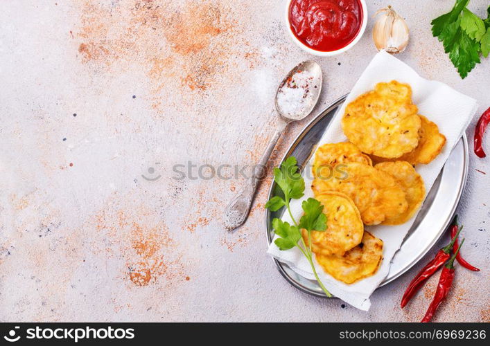 chicken cutlets on plate with tomato sauce