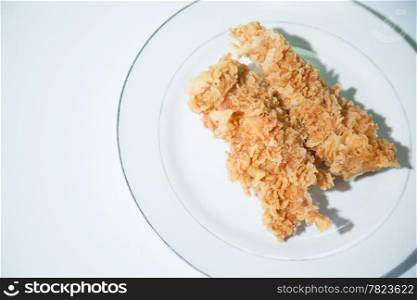 Chicken Deep fried. Placed on a white plate. Fried chicken pieces and variety.