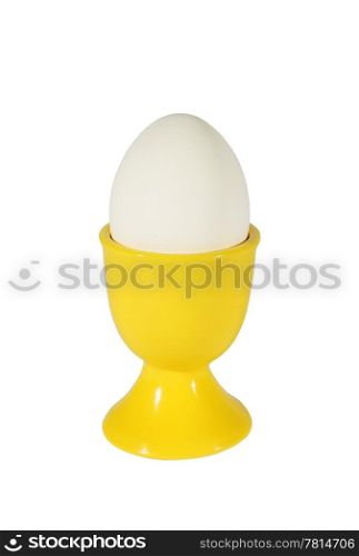 Chicken egg in yellow support on the white background