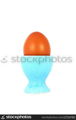 Chicken egg on the pedestal isolated on white