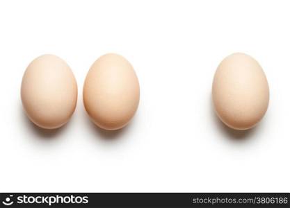 Chicken eggs on white background. Top view
