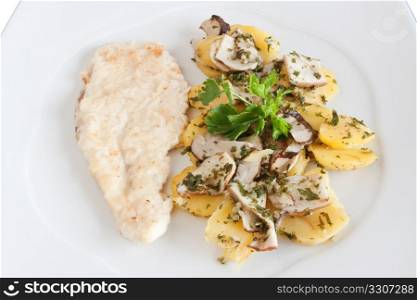 chicken escalope with baked potatoes and mushrooms
