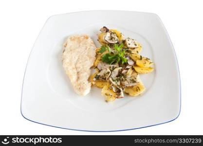 chicken escalope with baked potatoes and mushrooms isolated on white with clipping path