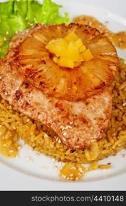 chicken fillet baked with pineapple, with rice and salad