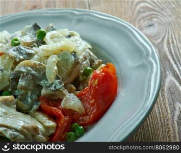 Chicken fricassee with mushrooms and cream style of Alsace - Plat Alsacien