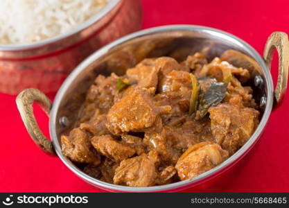 Chicken malabar curry in a traditional kadai or karahi bowl