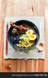 Chicken Miso Ramen, Flavor packed with a blended miso paste. Topped with buttered corn and chicken drumstick.