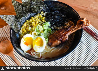 Chicken Miso Ramen, Flavor packed with a blended miso paste. Topped with buttered corn and chicken drumstick.