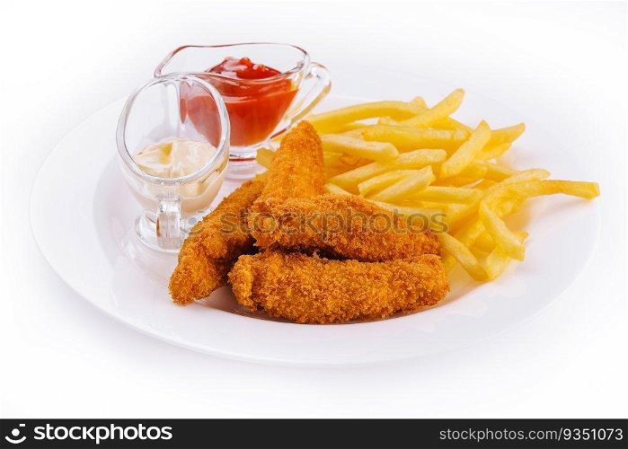 Chicken nuggets with french fries on plate