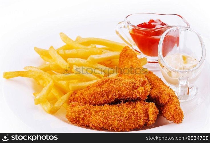 Chicken nuggets with french fries on plate