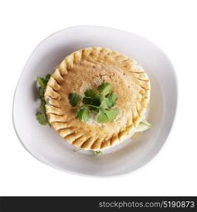 Chicken Pot Pie In A Plate isolated on white background. Chicken Pot Pie In A Plate