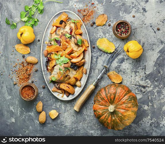 Chicken, pumpkin and vegetable meat stew.Autumn food.. Chicken ragout with pumpkin