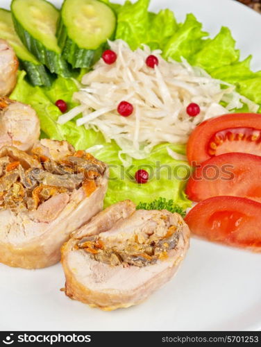 Chicken rolls with champignons and vegetables