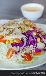 chicken salad. close up chicken and fresh vegetable salad with creamy sauce