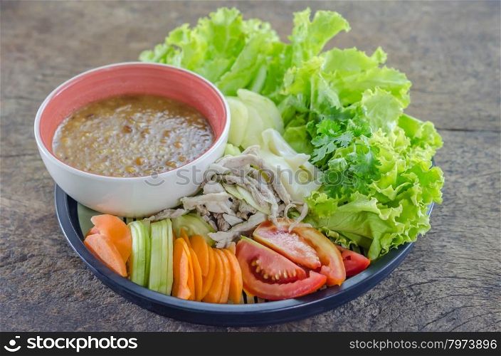 Chicken salad with bean sauce . steamed chicken with bean sauce and fresh vegetable salad