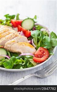 chicken salad with tomatoes and cucumber