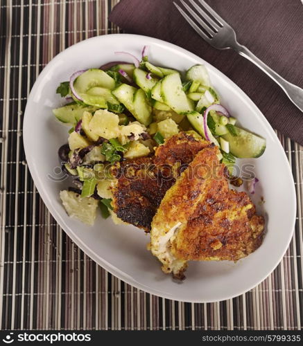 Chicken Schnitzel With Potato Salad And Cucumbers