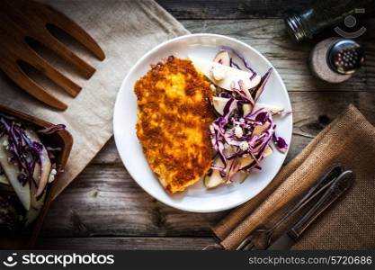 Chicken schnitzel with red cabbage,pears and gorgonzola