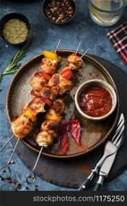 Chicken Shish kebab with mushrooms, cherry tomato and sweet pepper, Grilled meat skewers. Top view.