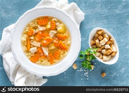 Chicken soup, bouillon with meat, pasta and vegetables
