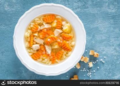 Chicken soup, bouillon with meat, pasta and vegetables