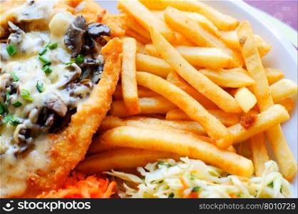 chicken steak with fries / chips and salad