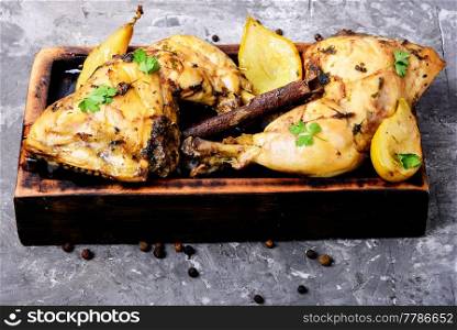 Chicken stewed in pear sauce.Autumnal meat dish. Chicken stewed in pear