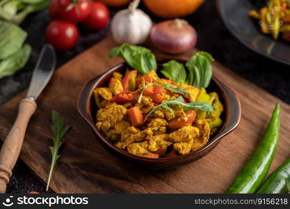 chicken Stir Fried Chili Along with bell pepper Tomatoes and carrots.