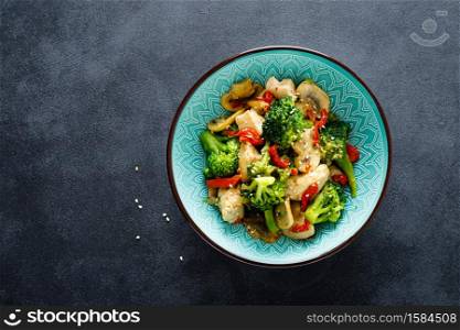 Chicken stir fry with vegetables and mushrooms