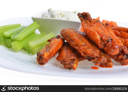 chicken wings with celery, carrot and blue cheese sauce