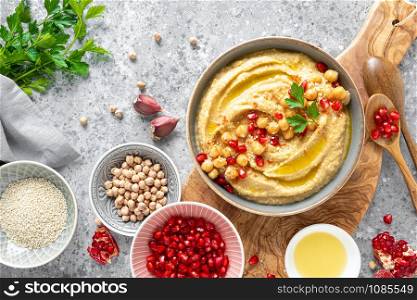 Chickpea hummus with tahini in a bowl. Healthy vegetarian appetizer. Middle Eastern cuisine