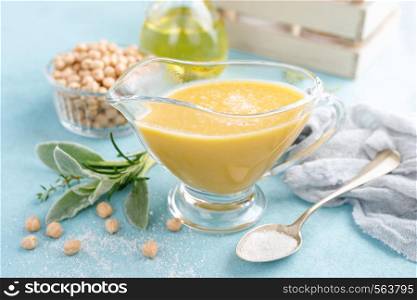 Chickpea sauce, hummus with ingredients for cooking
