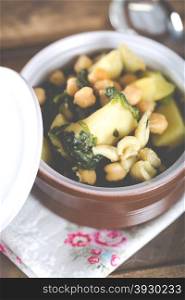 Chickpeas stewed with sepia spinach and potatoes