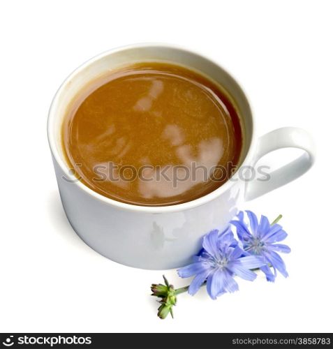 Chicory drink in a white cup, flower isolated on white background