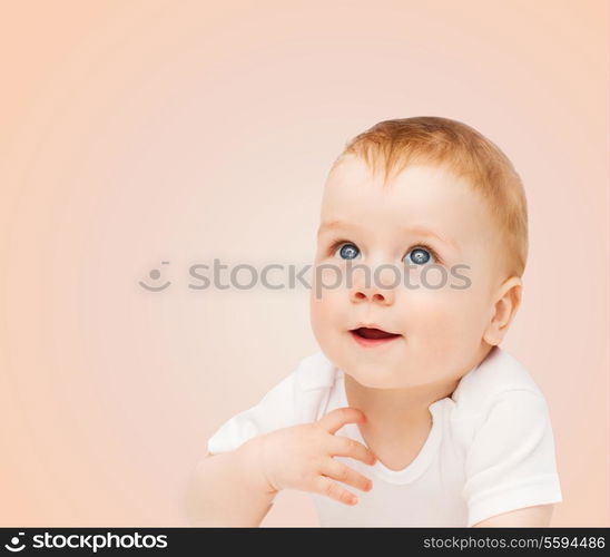 child and happiness concept - smiling baby