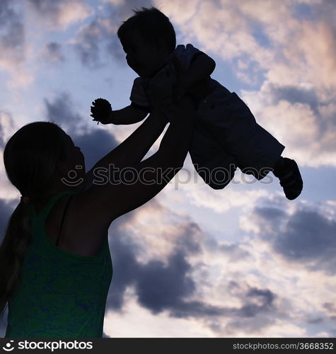 Child and mother silhouette