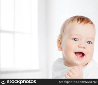 child and toddler concept - smiling little baby