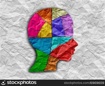Child autism developmental disorder puzzle children symbol as an autistic child awareness icon as pieces of crumpled paper coming together to form a young student head in a 3D illustration style.