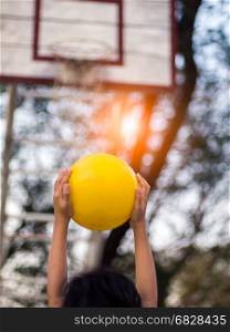child beginer to play basketball.