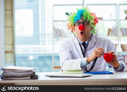 Child cardiologist with stethoscope and heart. The child cardiologist with stethoscope and red heart