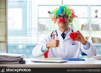 Child cardiologist with stethoscope and red heart. The child cardiologist with stethoscope and red heart