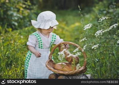 Child dress food boy walks in the garden.. Little girl in vintage dress walking in the garden 4628.