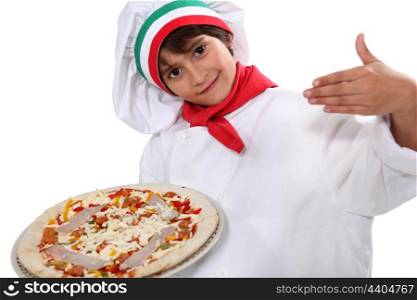 Child dressed as pizza chef