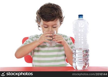 Child drinking water a over white background