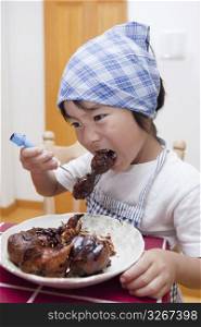 child eating food