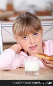 child eating tartine