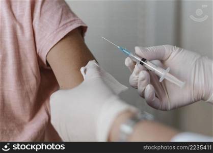 child getting vaccine